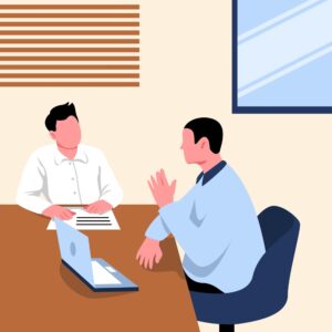 A photo of a therapist and patient engaged in one-on-one outpatient drug treatment counseling in a bright, welcoming office.